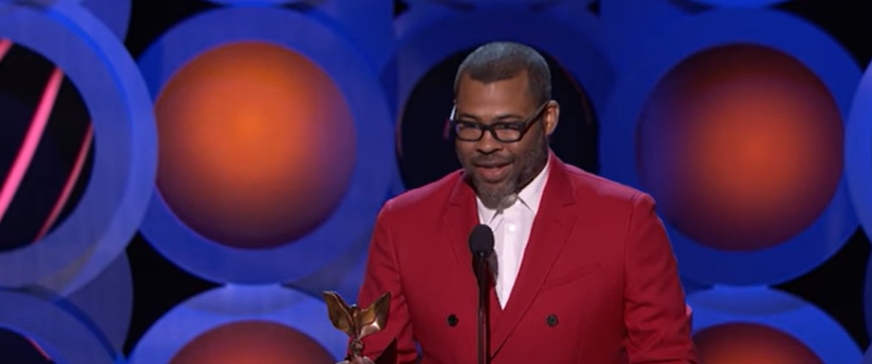 Jordan Peele accepts the award for Best Director for Get Out at the 2018 Spirit Awards